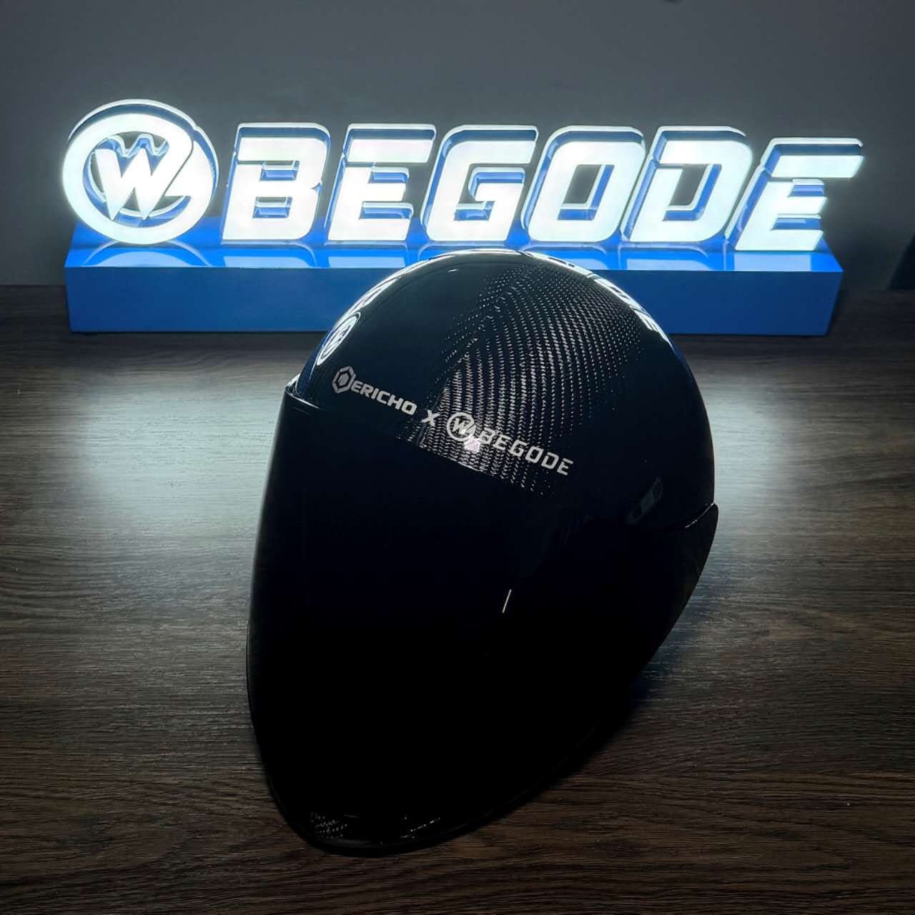 Jericho x Begode custom helmet displayed with an illuminated Begode logo