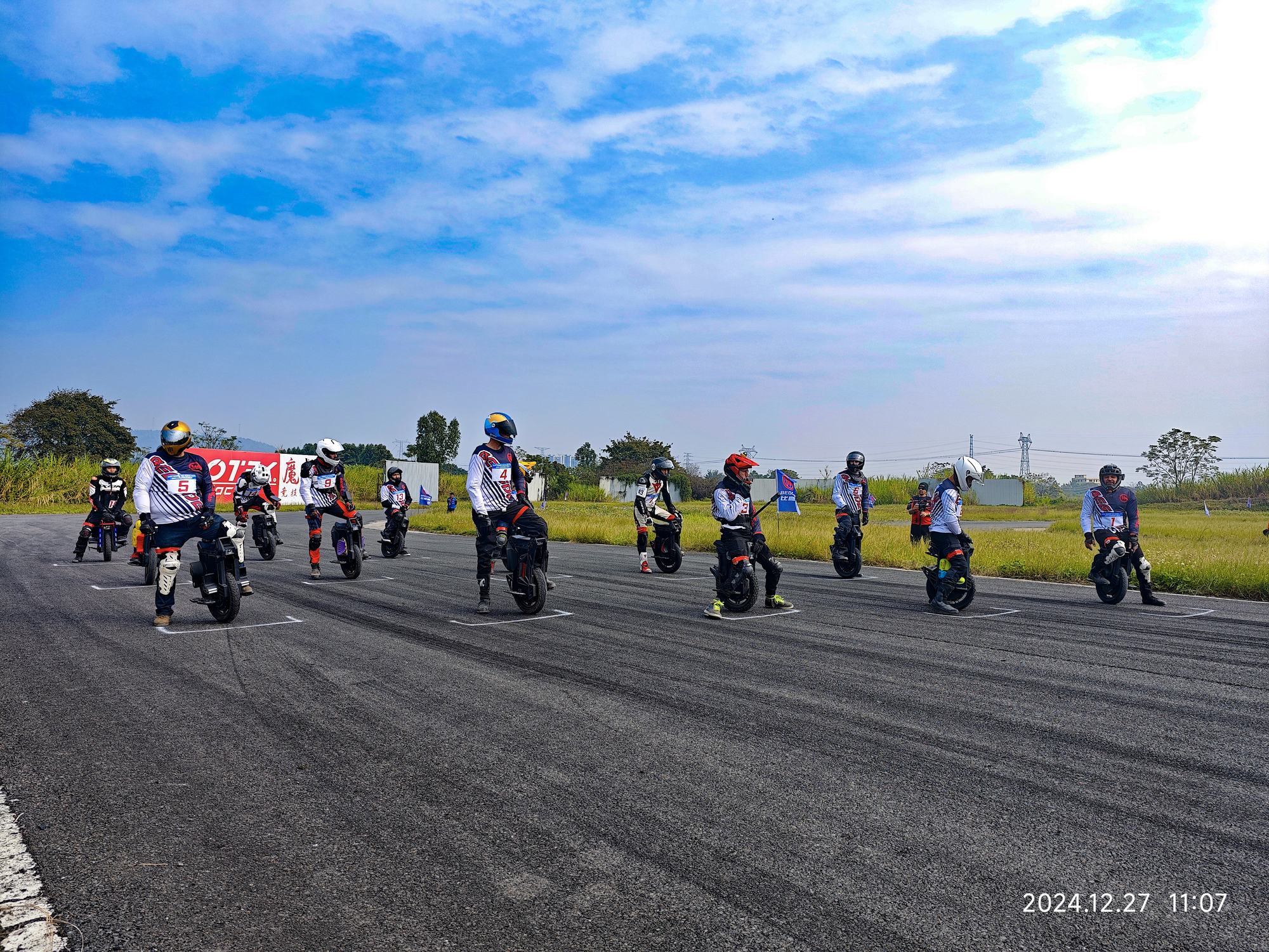 BEGODE riders on a paved course